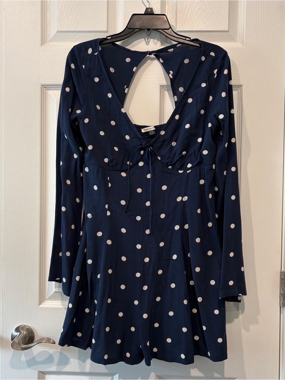 American Eagle Navy Polka Dot Long Sleeve Romper
